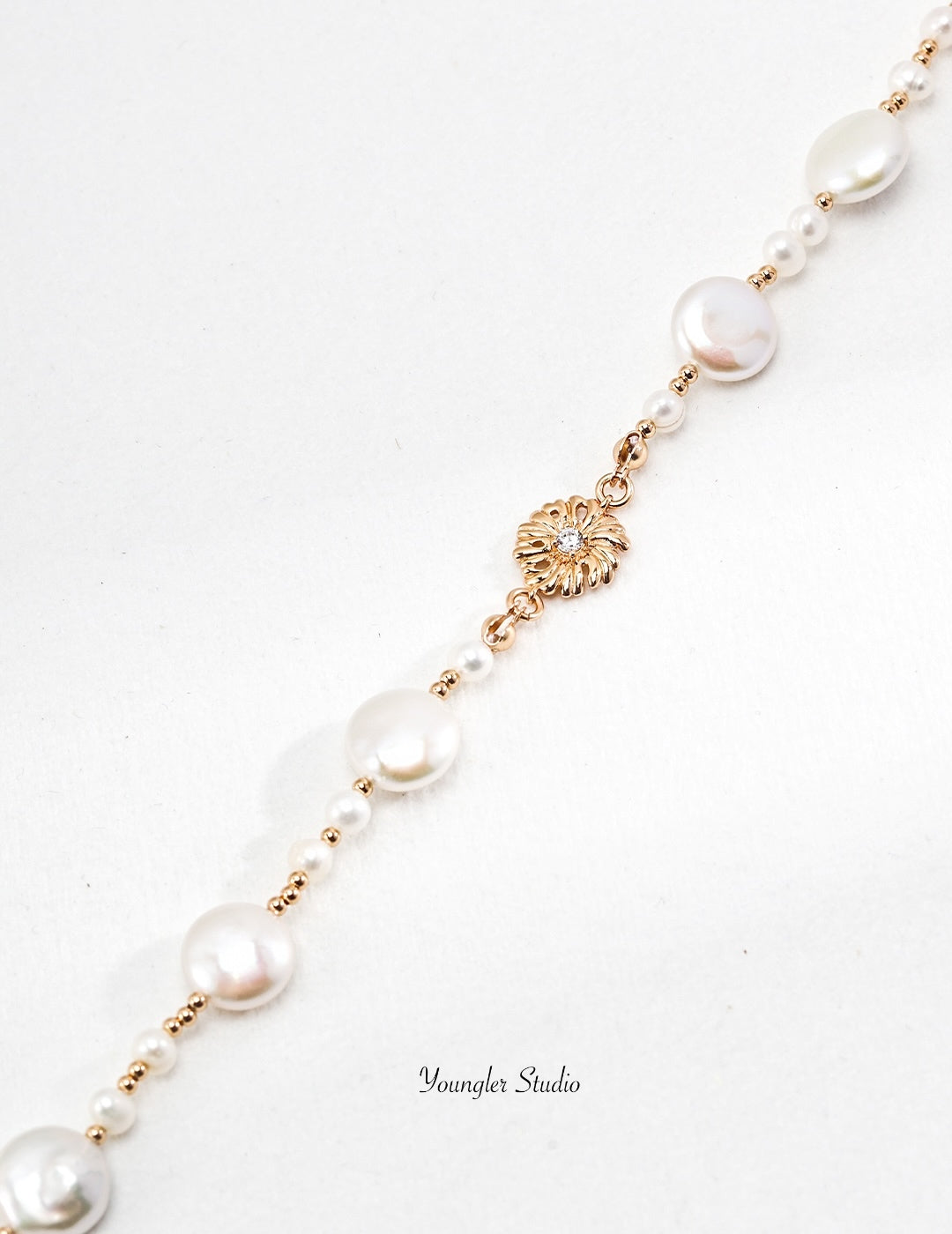 Engraved Floral Pearl Strand