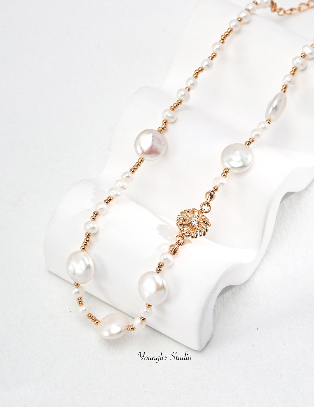 Engraved Floral Pearl Strand