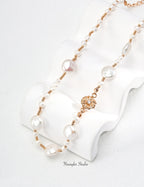 Engraved Floral Pearl Strand