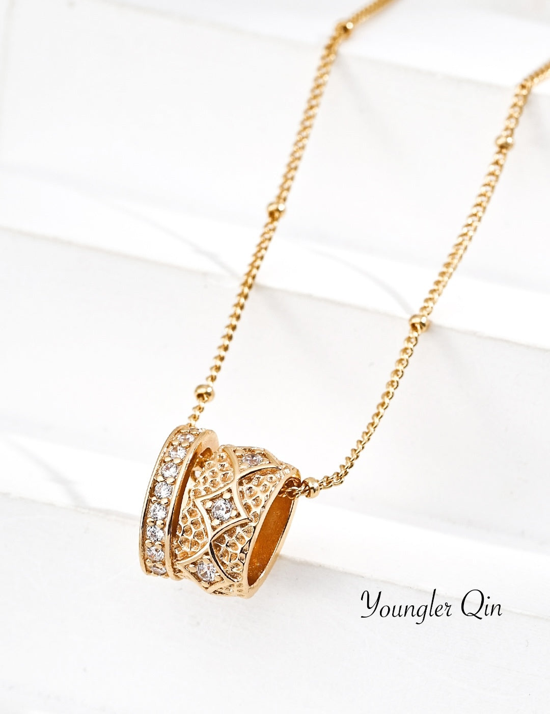 Carved Pendant · Metal Muse
