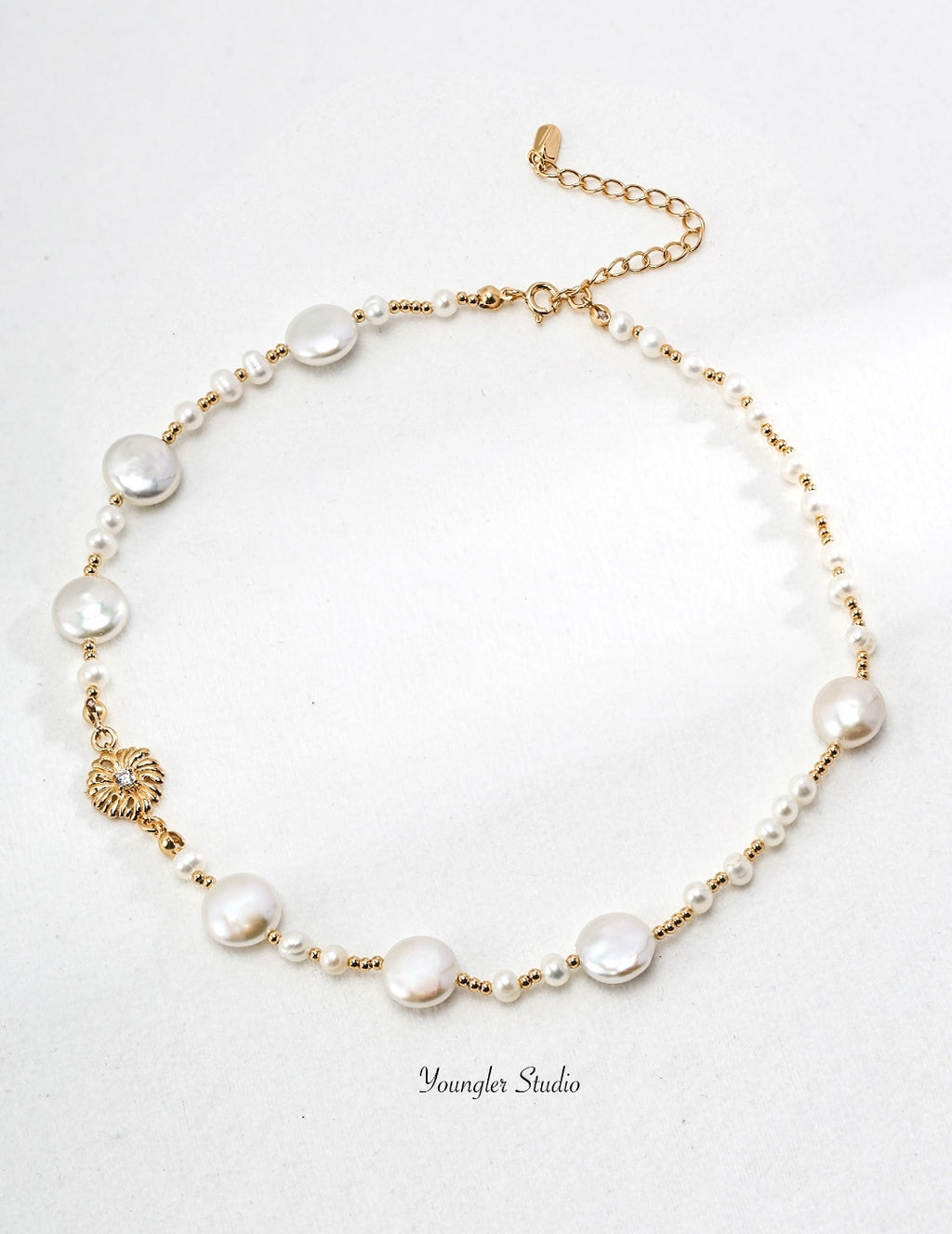 Engraved Floral Pearl Strand