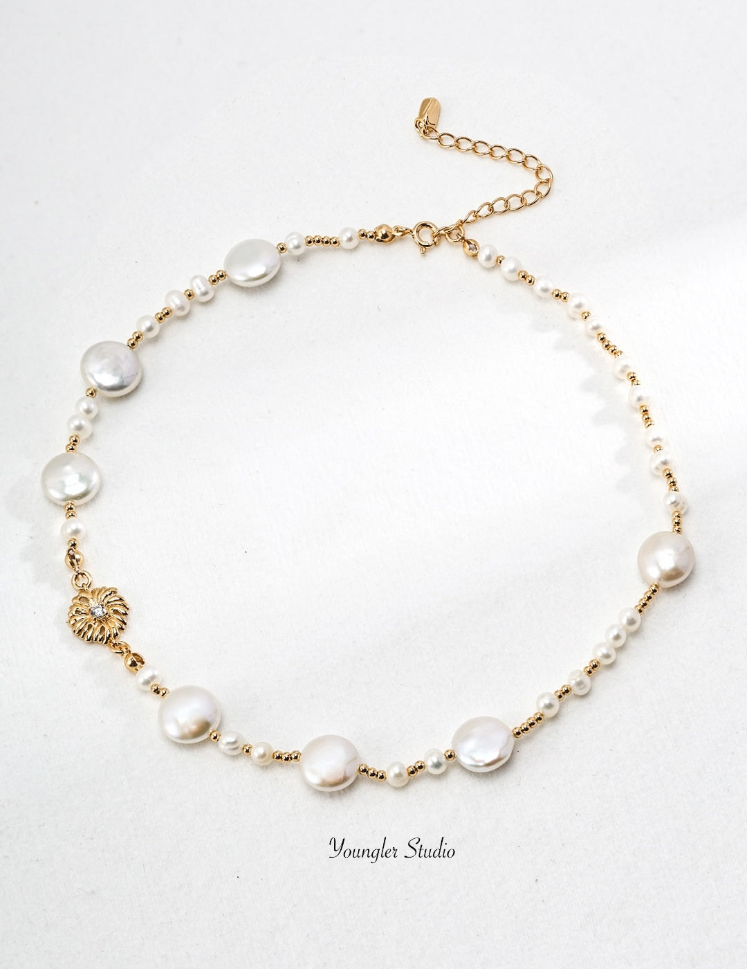 Engraved Floral Pearl Strand